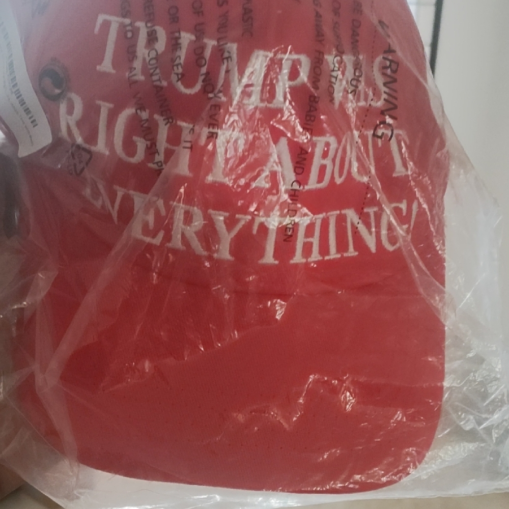 Red Cap with White Text